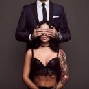 Cover-eyes-sexy-woman-with-tattoo-lingerie